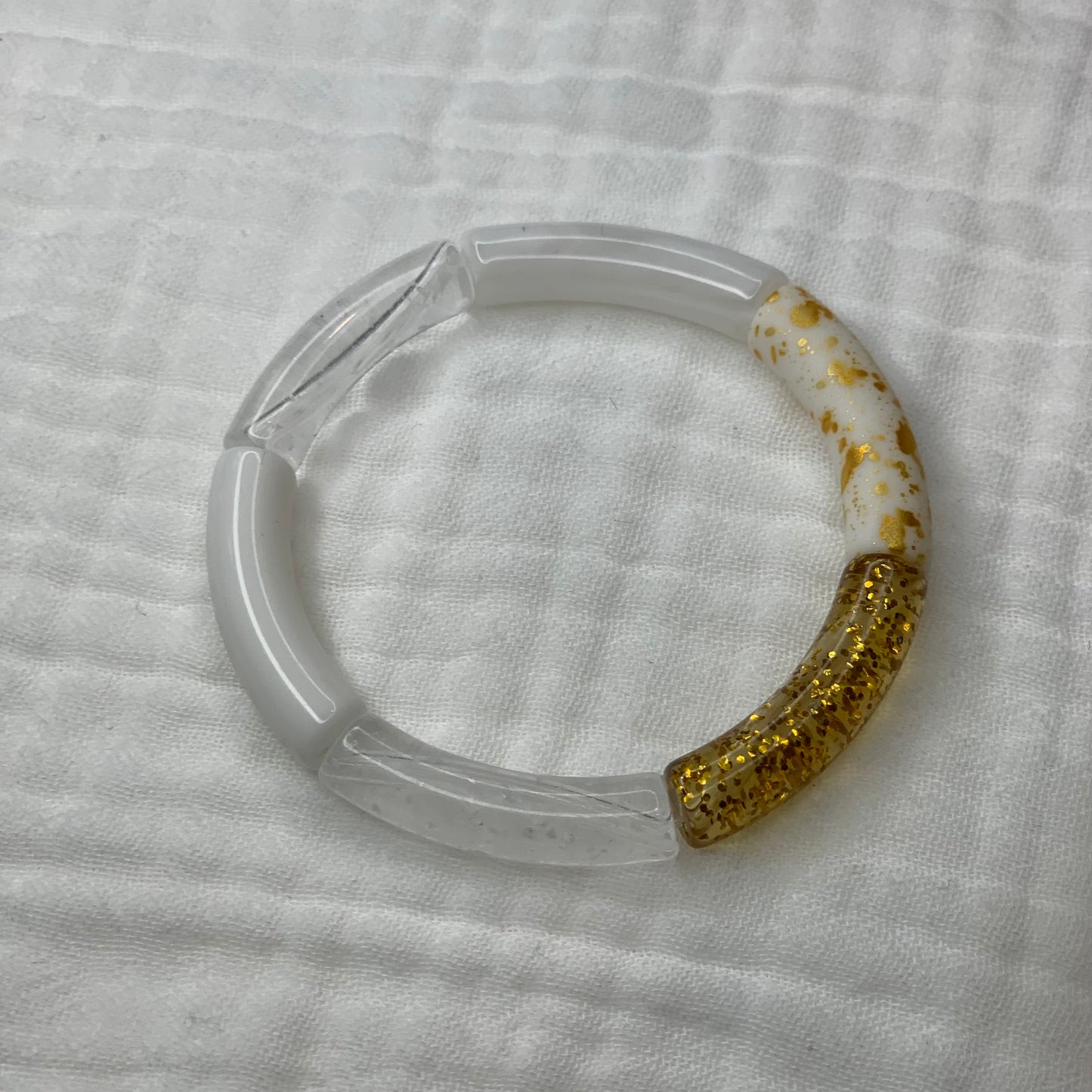 Bracelets élastiques tons blancs