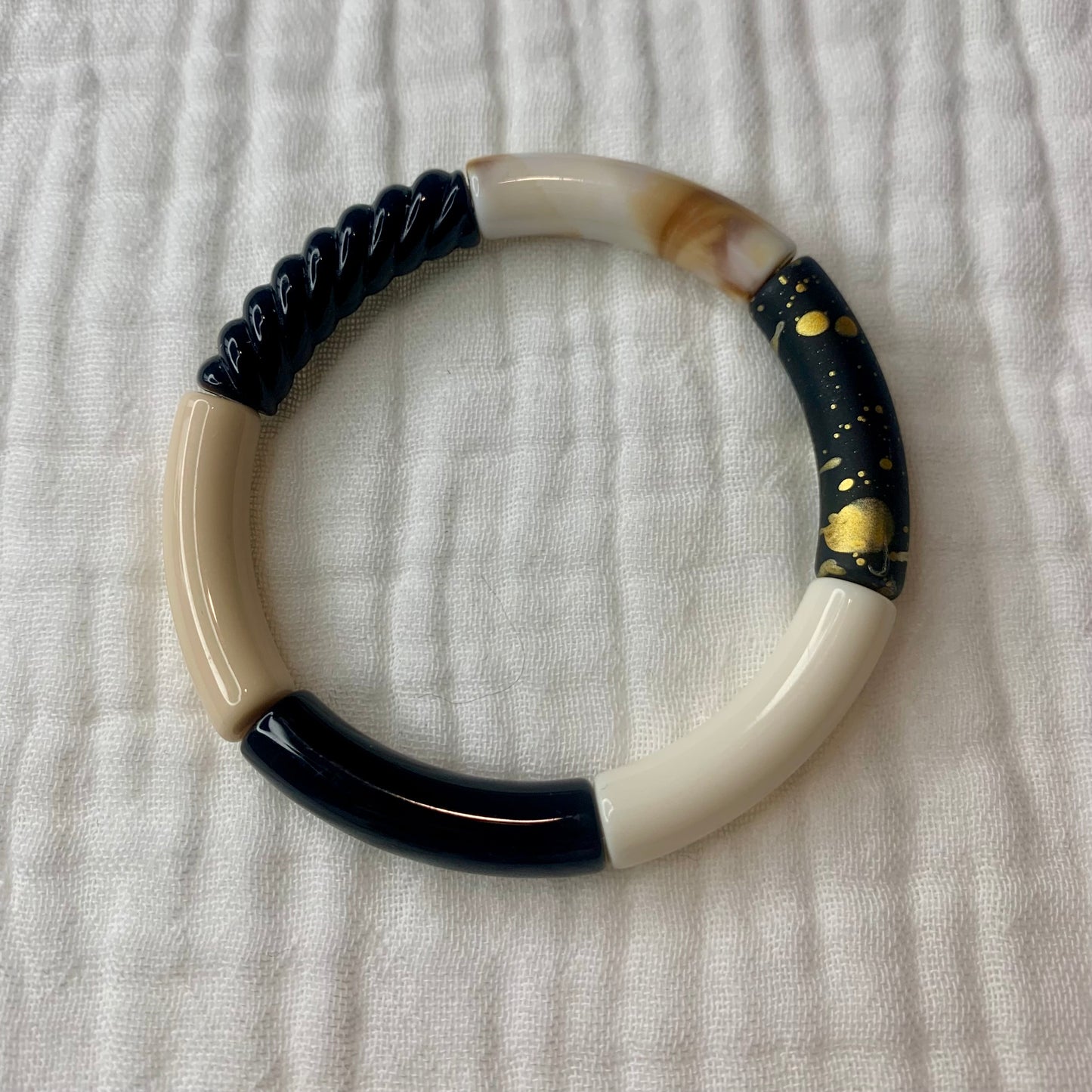Bracelets joncs tons noirs et doré