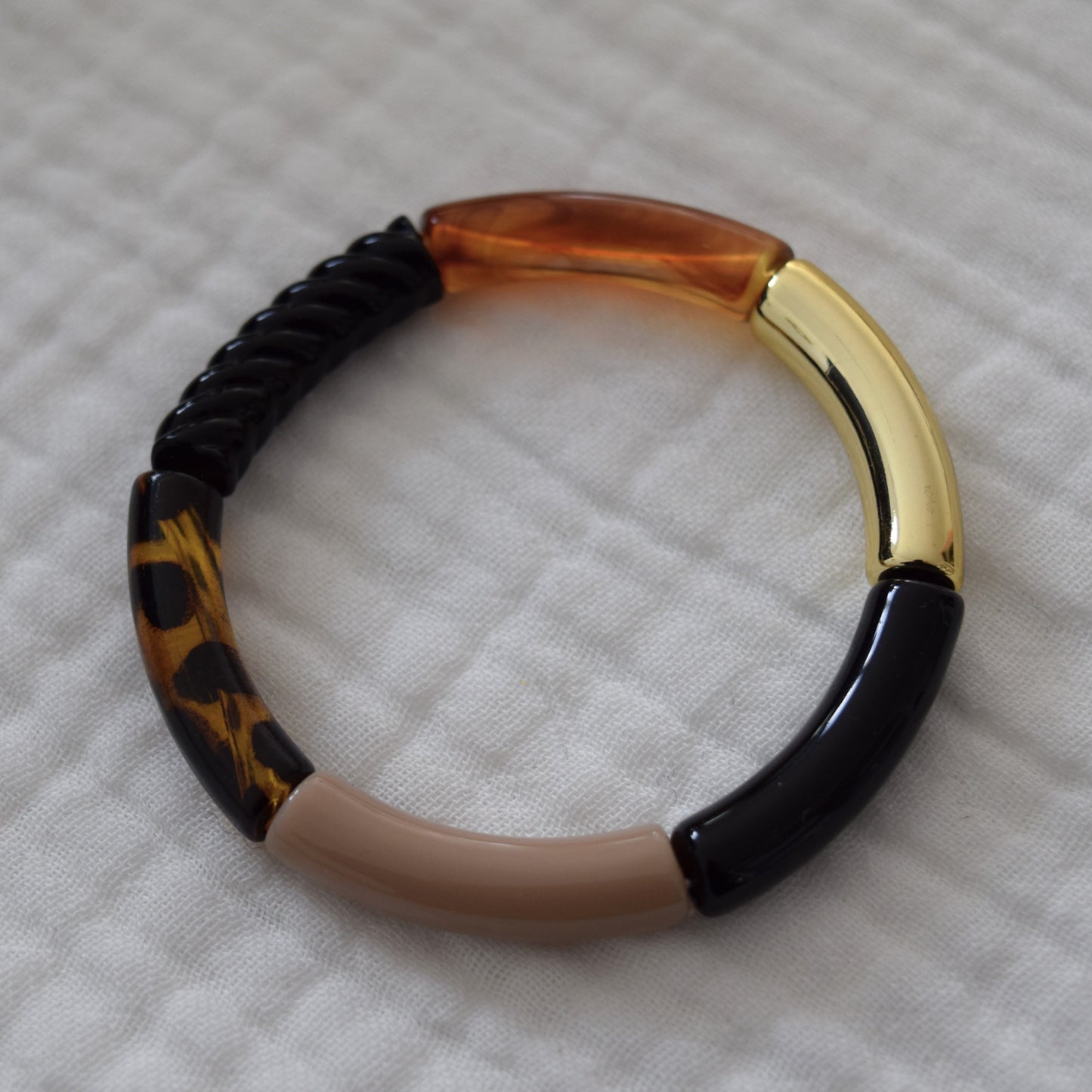 Bracelets joncs tons noirs et doré