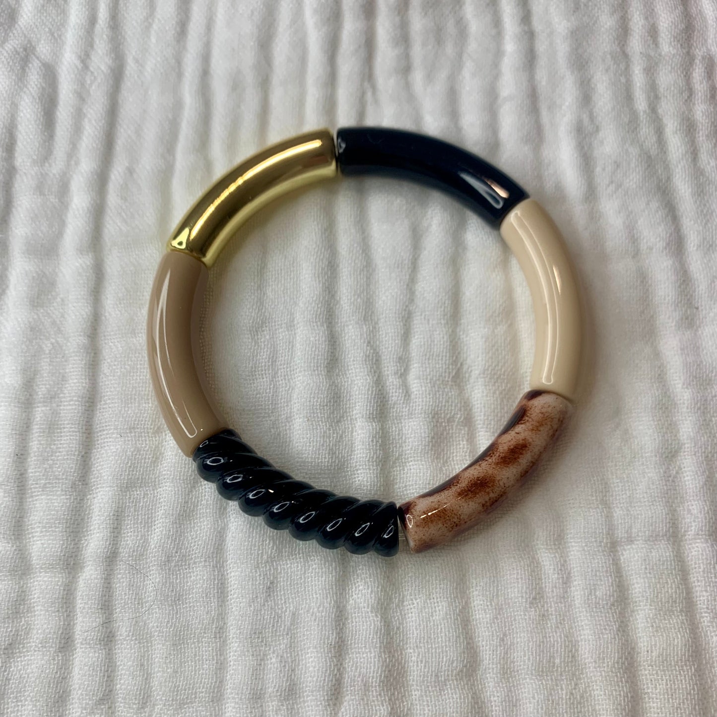 Bracelets joncs tons noirs et doré