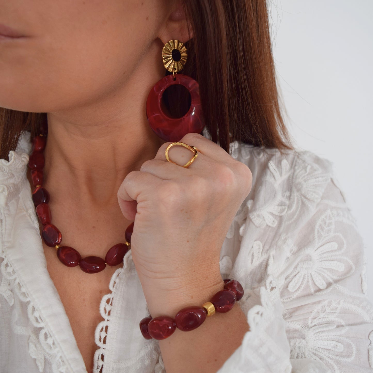 Bijou femme bordeaux chic et intemporel doré
