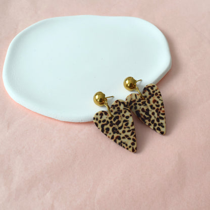 boucles cœur sauvages style félin