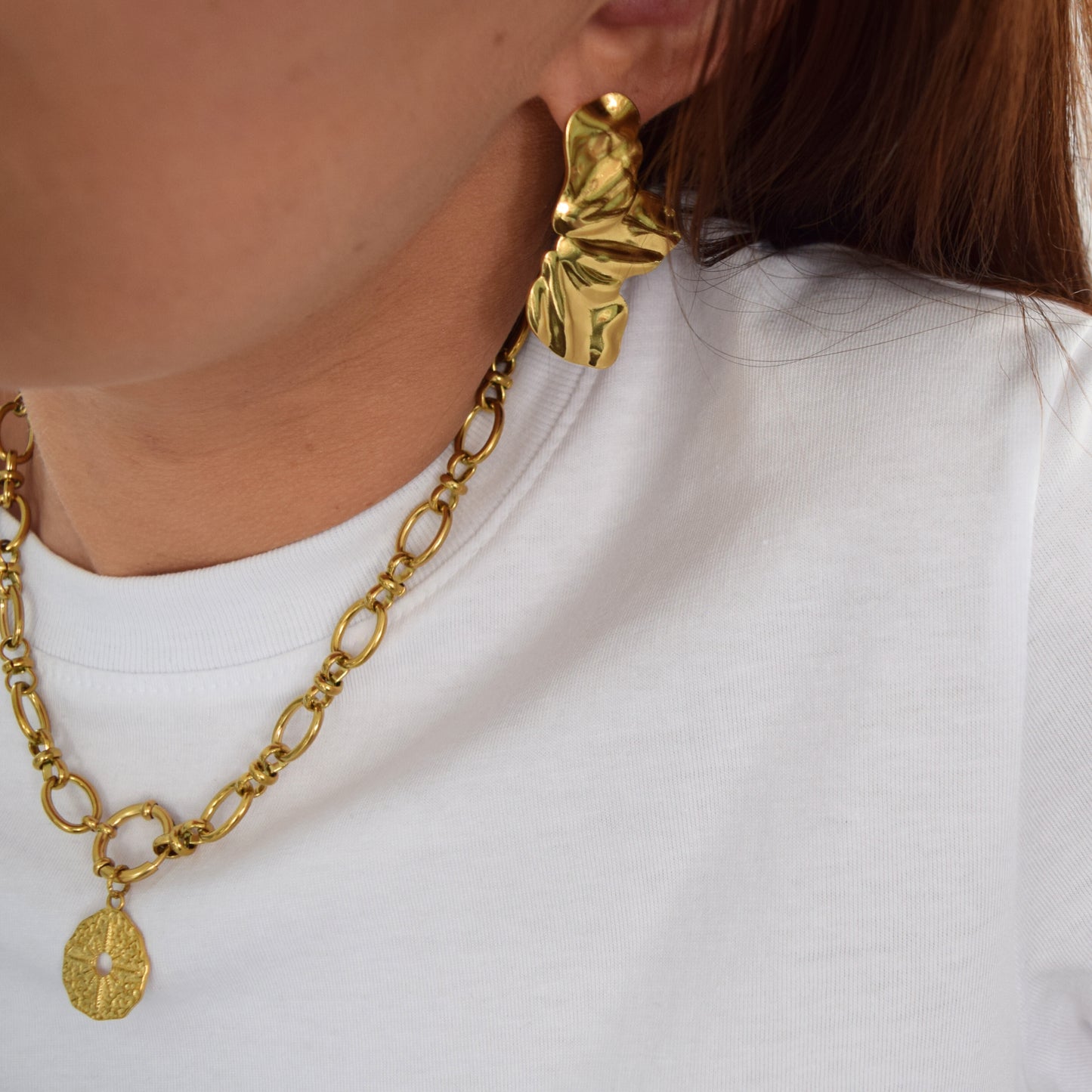 Boucles modernes en acier inoxydable