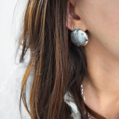Boucles brillantes texturées