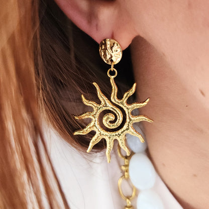 boucles oreilles dorées inspiration solaire