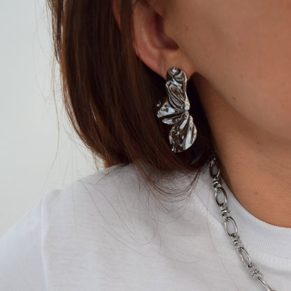Boucles modernes en acier inoxydable