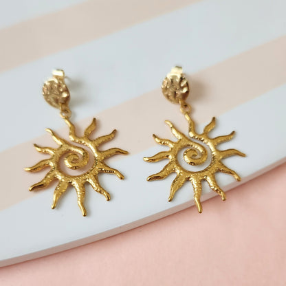 boucles oreilles soleil tendance femme