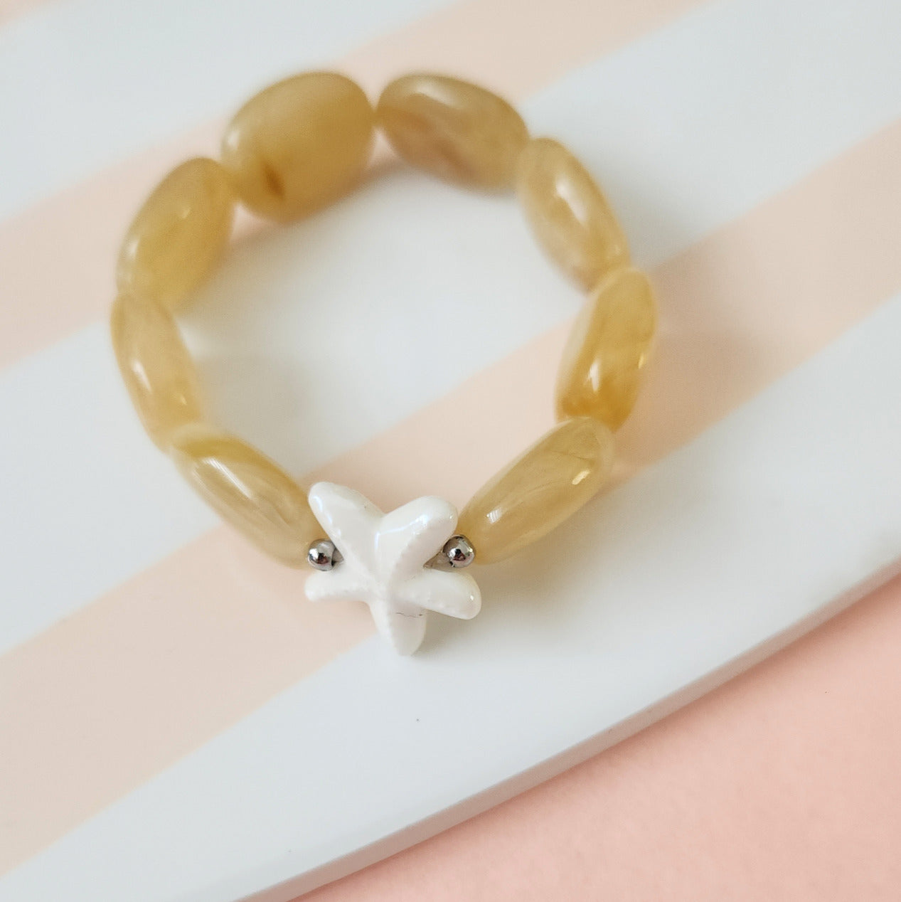 bracelet calypso perles beiges