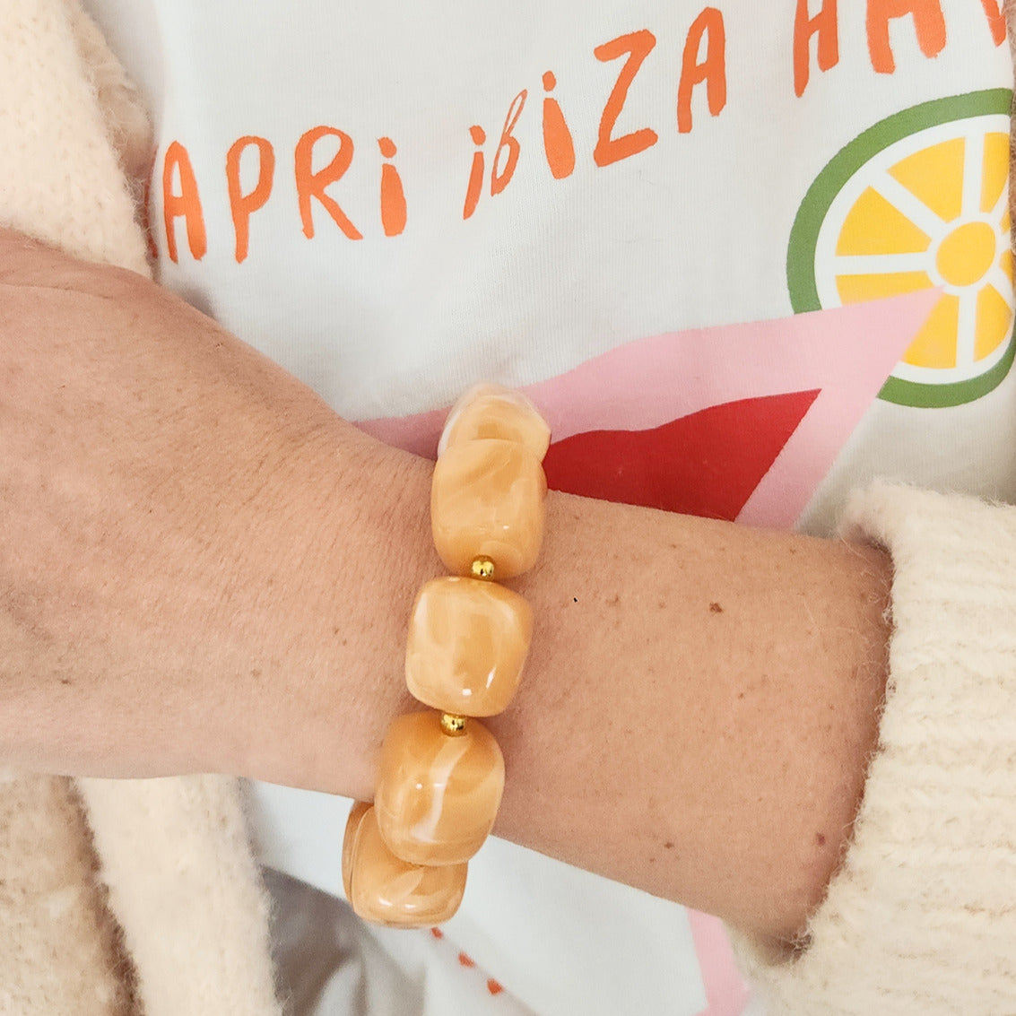 bracelet femme élégant tons saumon lumineux