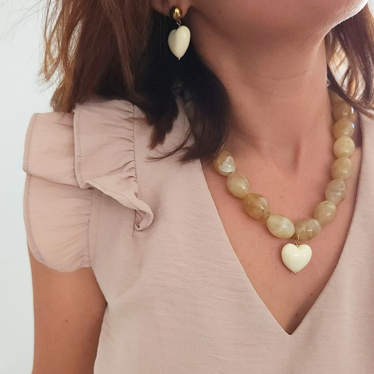 Collier MELIA en acier inoxydable doré avec cœur écru