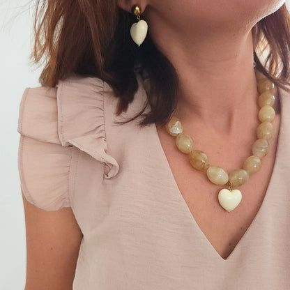 Collier MELIA en acier inoxydable doré avec cœur écru