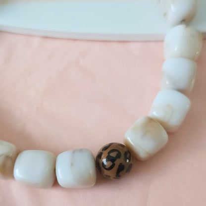 collier femme marbré