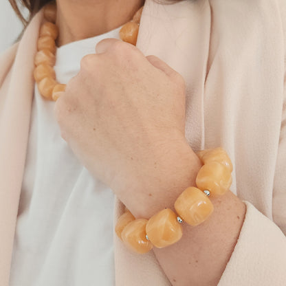 bracelet femme élégant tons oranges