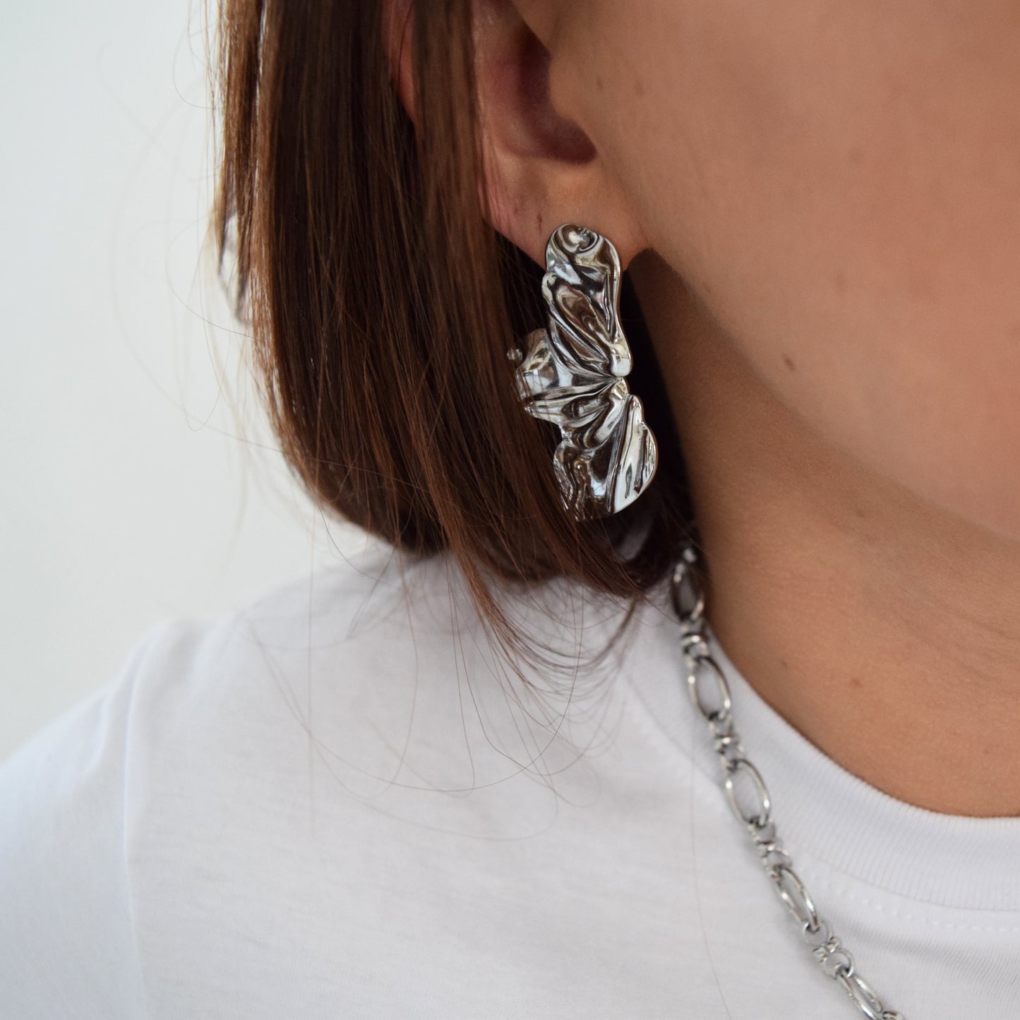 Boucles d’oreilles argentées lumineuses