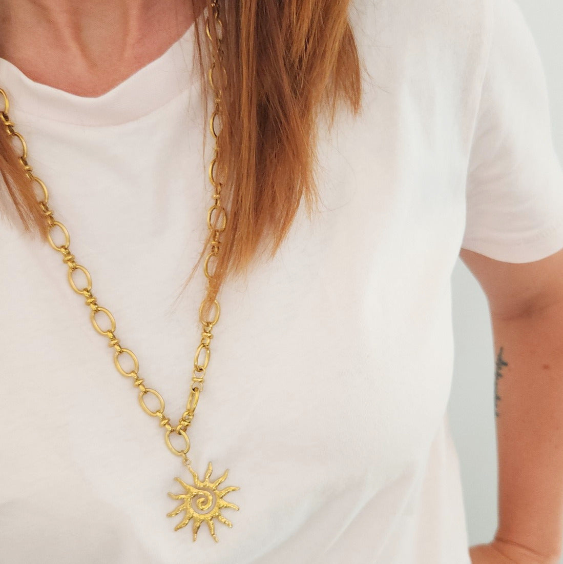 pendentif soleil acier inoxydable femme